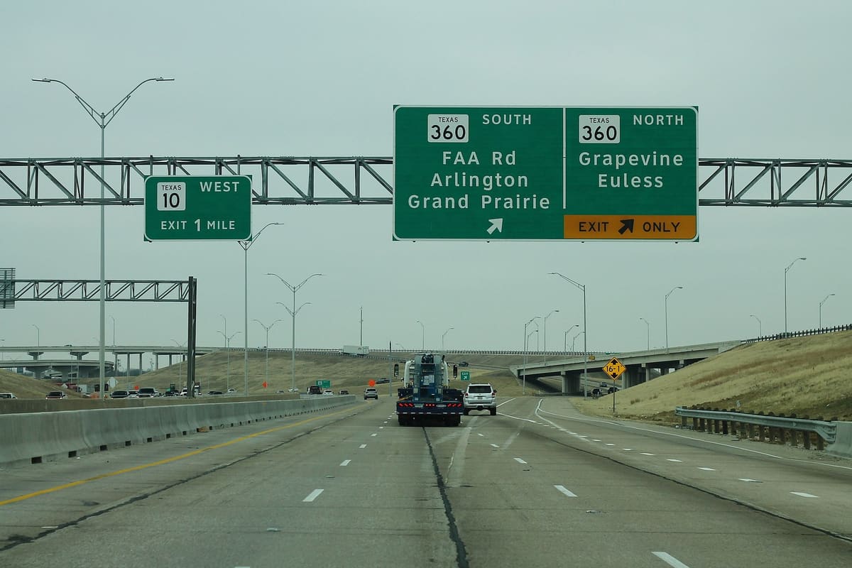 Overhead freeway signs for SH 360 north to Grapevine and Euless, SH 360 south to FAA Road, Arlington, and Grand Prairie, and the SH 10 west exit one mile ahead