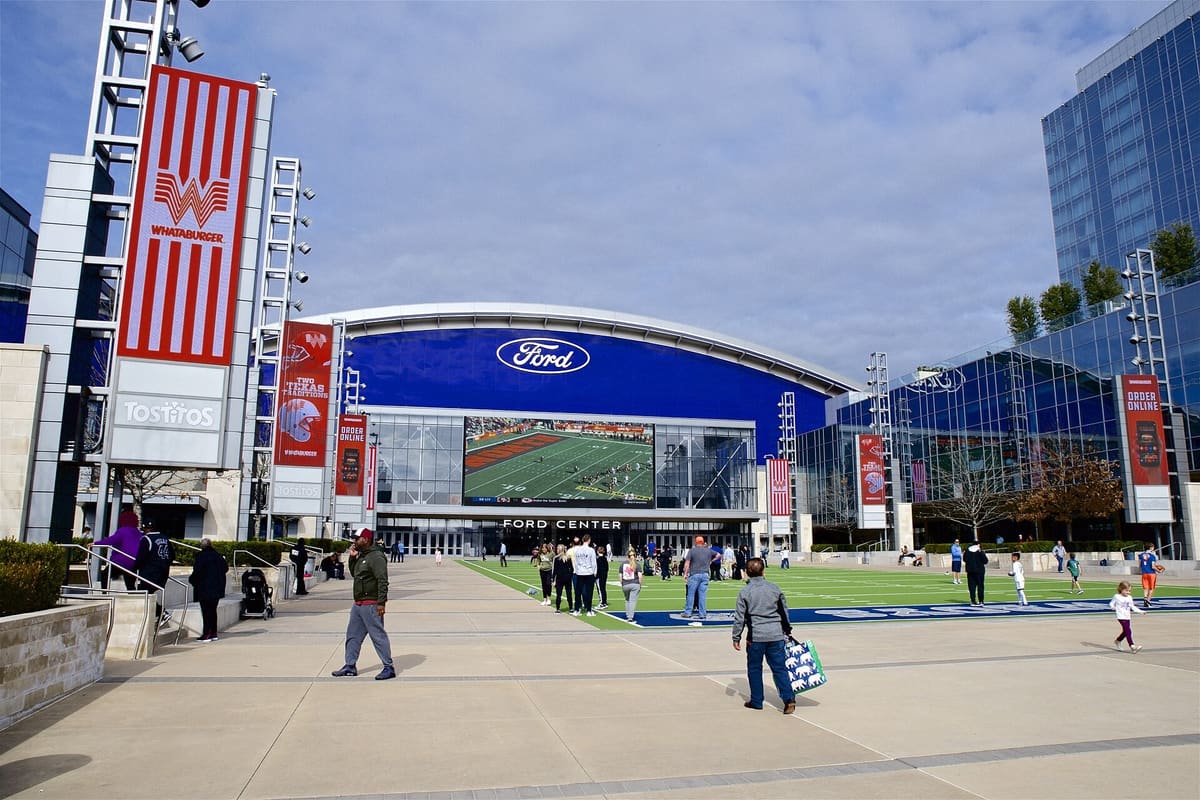 The Ford Center at The Star with Tostitos Championship Plaza and its turf field in front