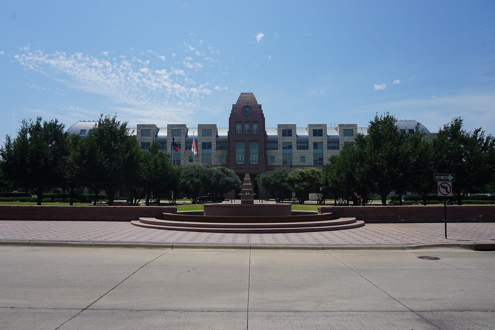 The George A. Purefoy Municipal Center, Frisco's city hall, behind the fountain plaza at Frisco Square