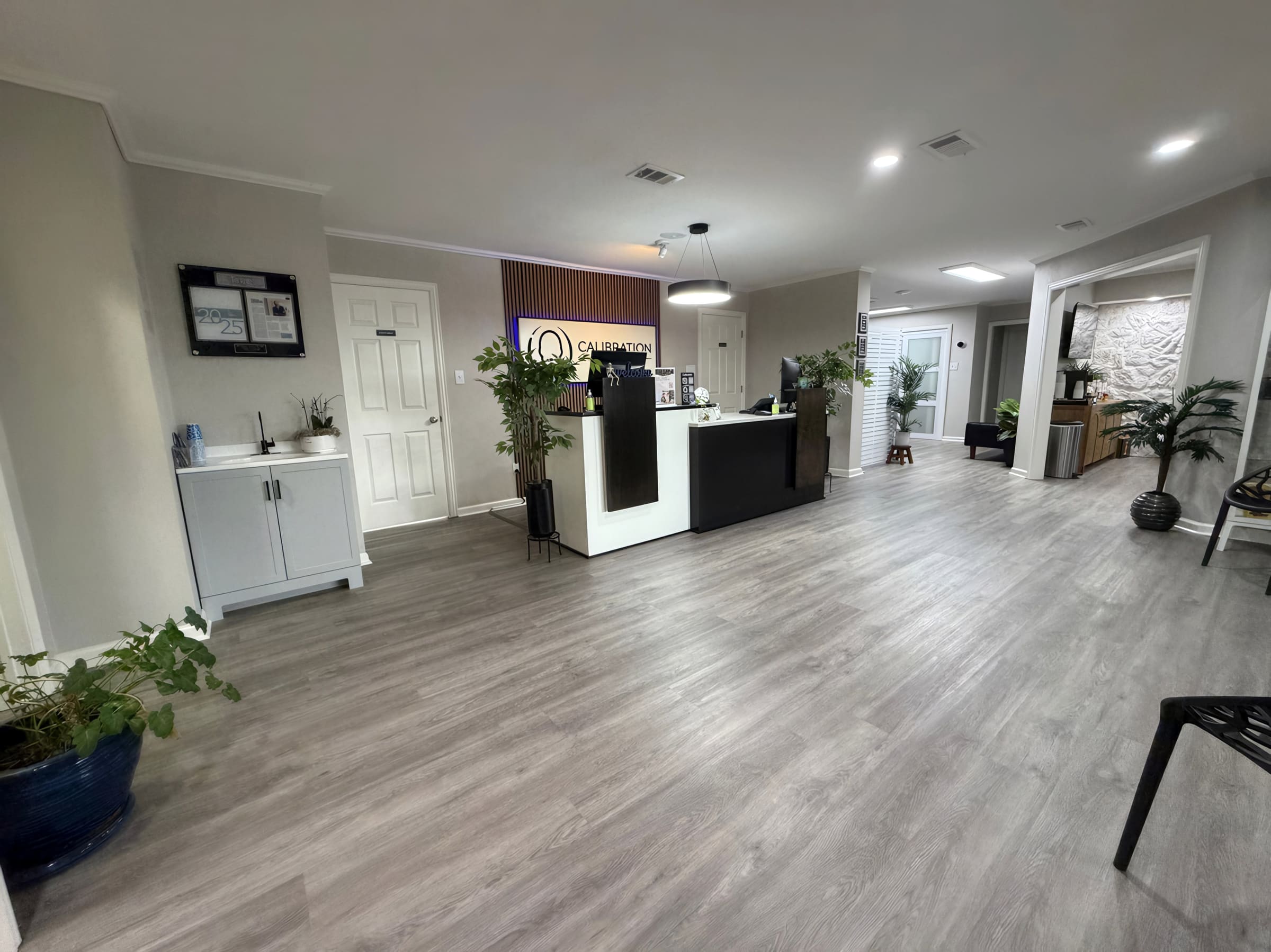 Front desk corridor at Calibration Brain & Body in Frisco, delivered by MASACO in five weeks