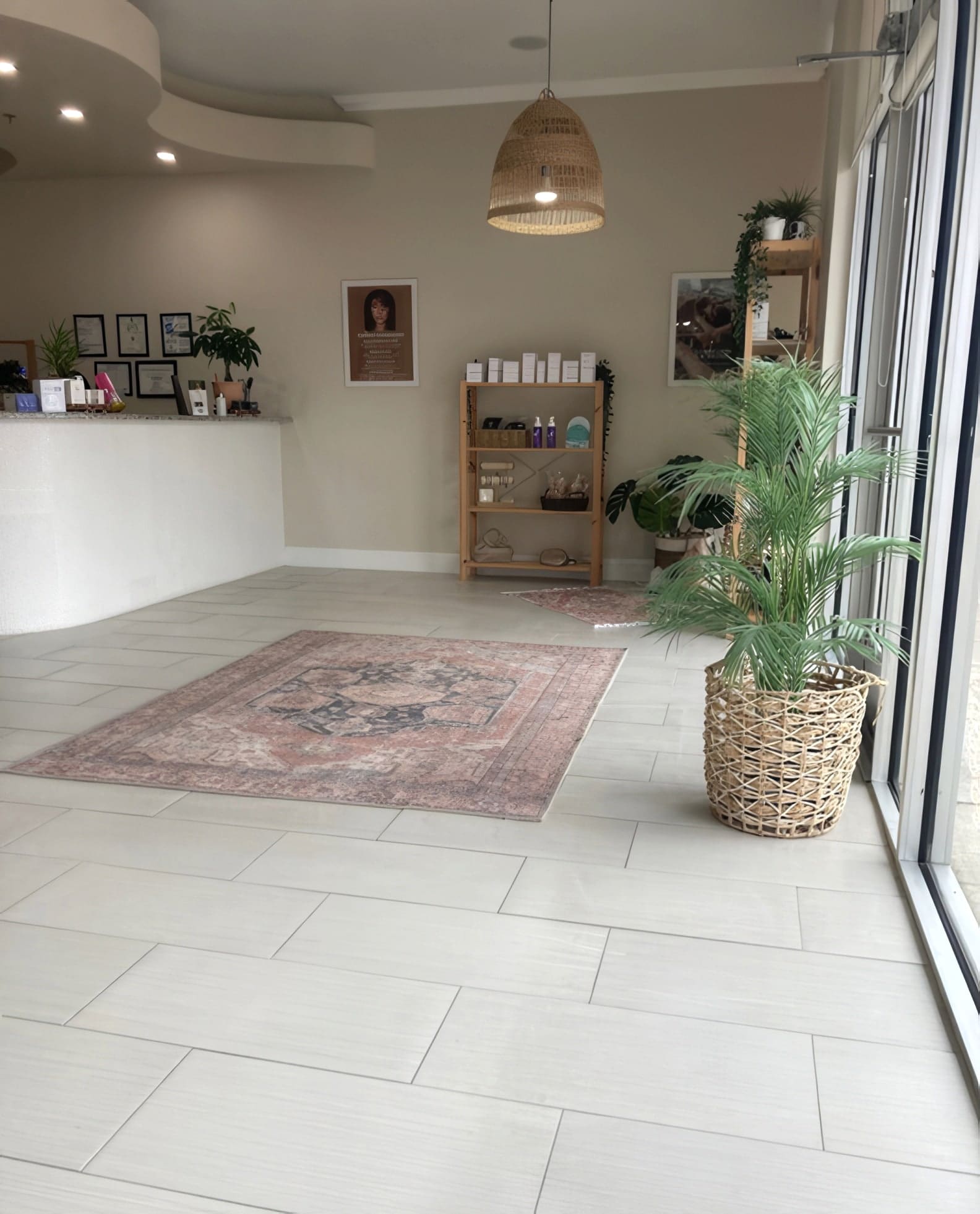 Large-format tile corridor at Cielo Beauty Bar in Celina, Texas, tile and plumbing work by MASACO Construction