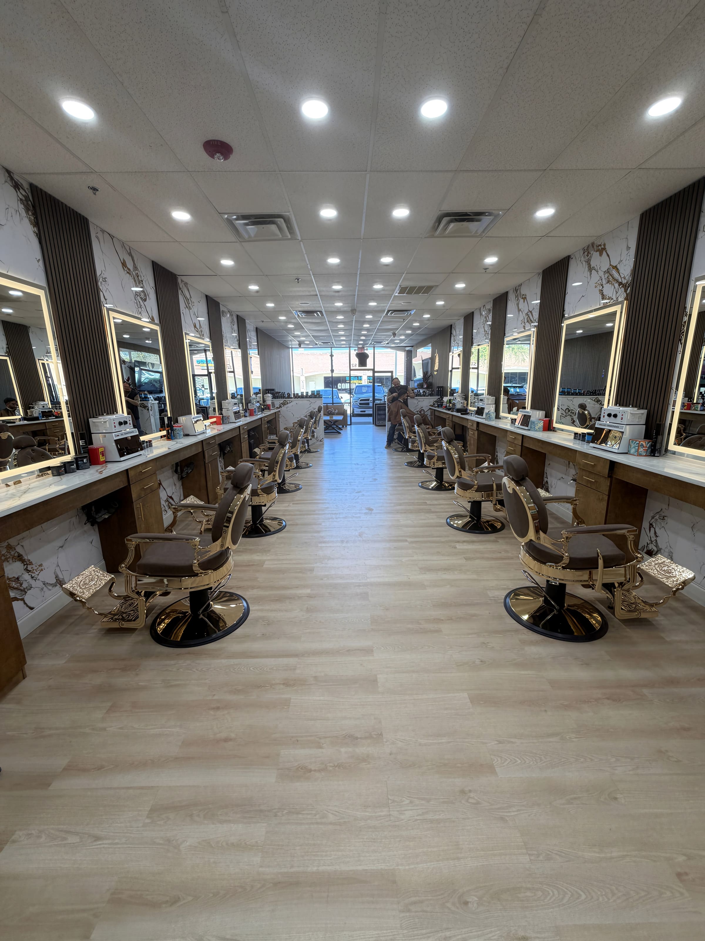 Fade & Style Barber Shop shop floor in Allen, a shell-to-open tenant improvement by MASACO